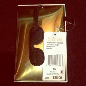 Micheal Kors monogram charms “ mk aviator